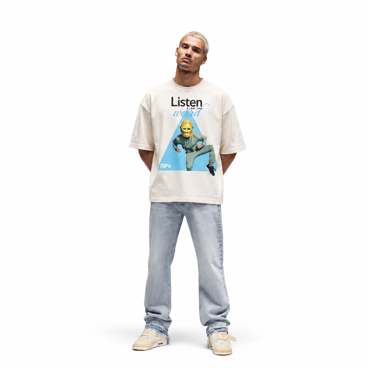 Model in the Sandstone oversized tee with the Listen to your inner weird print, full length