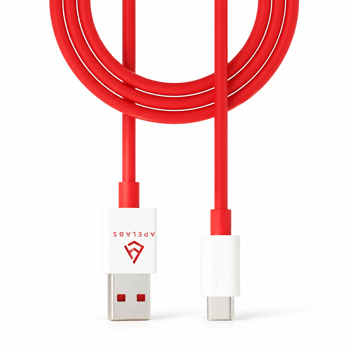 APe Charge cable in red, coiled, with its USB-A and USB-C ends shown