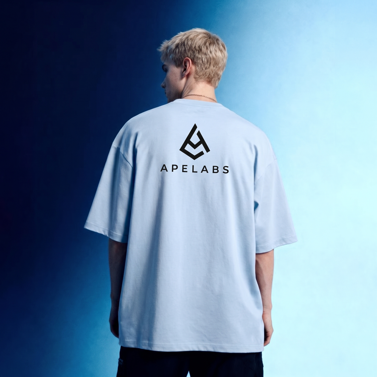 Back of the Glacier Blue oversized tee, ApeLabs logo between the shoulders