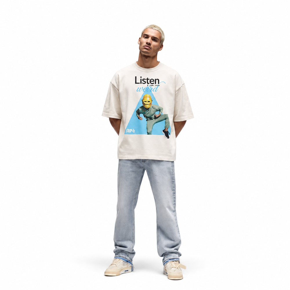 Model in the Sandstone oversized tee with the Listen to your inner weird print, full length