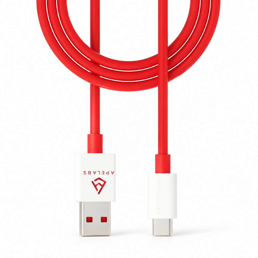 APe Charge cable in red, coiled, with its USB-A and USB-C ends shown